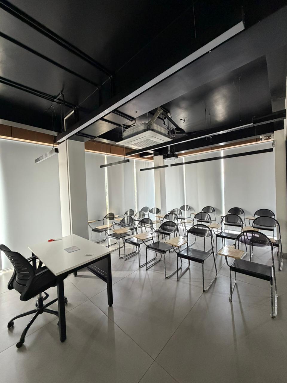 Thrissur centre classroom with trainer desk and projector