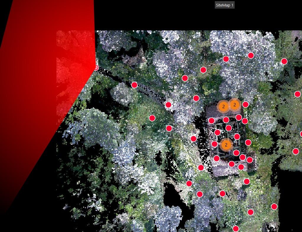 Top-down LiDAR scan coverage map showing red scan position markers distributed around the Kuttikanam building