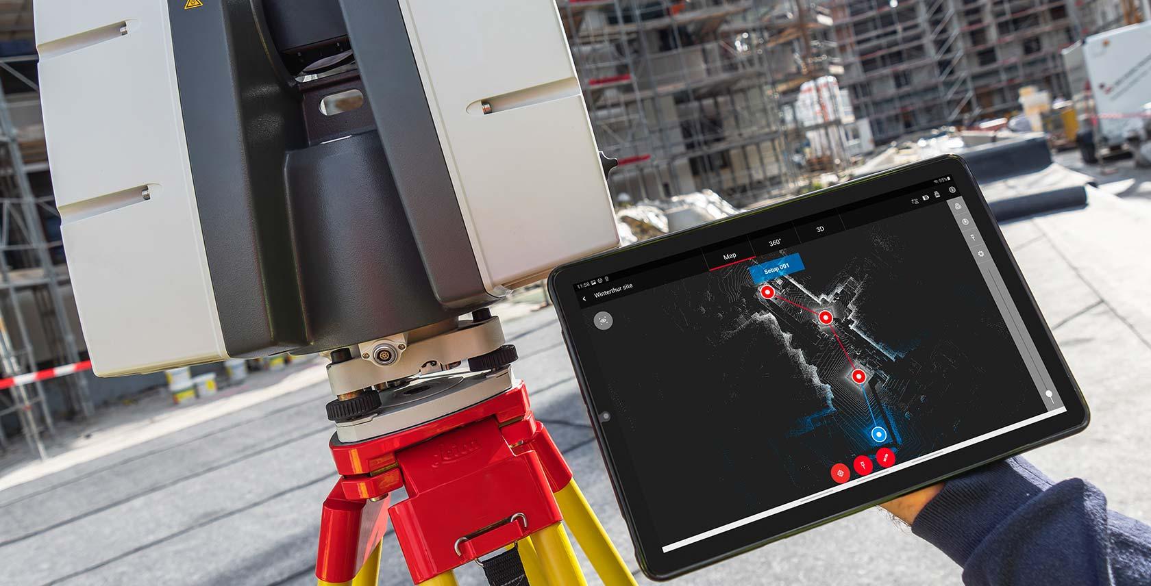 Terrestrial LiDAR scanner mounted on a tripod with a tablet showing live scan position tracking